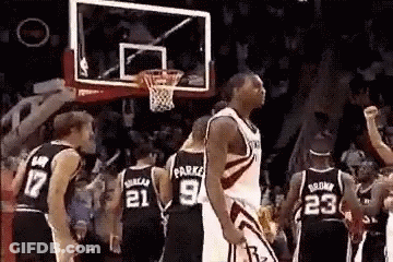 Basketball Players Around Hoop Number 9 GIF