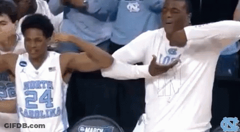Basketball Players Dancing In Front Of Crowd GIF