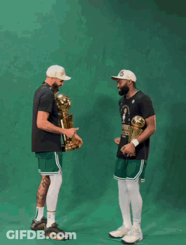 Basketball Players Holding Boston Celtics Trophy GIF