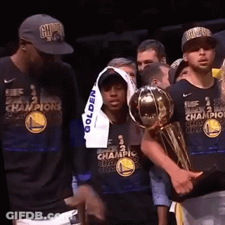 Basketball Players Holding Trophy GIF