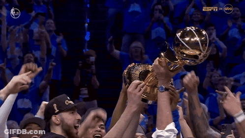 Basketball Players Holding Trophy GIF
