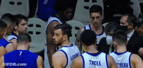 Basketball Players Huddled Together Number 7 GIF
