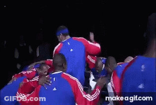 Basketball Players Huddled With Number 24 GIF