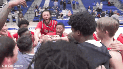 Basketball Players Huddled With Red Kings Jersey GIF