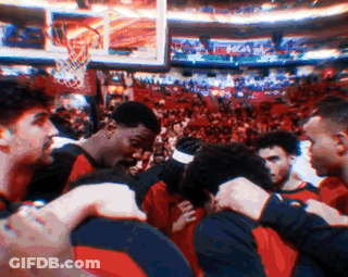 Basketball Players Hugging In Stadium GIF