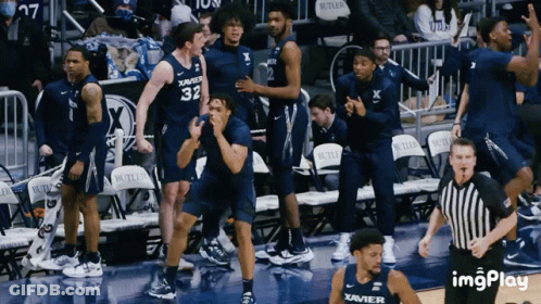 Basketball Players In Blue Xavier Uniforms GIF