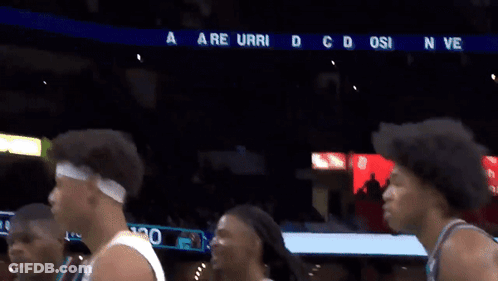 Basketball Players In Front Of Scoreboard Saying No Emb GIF