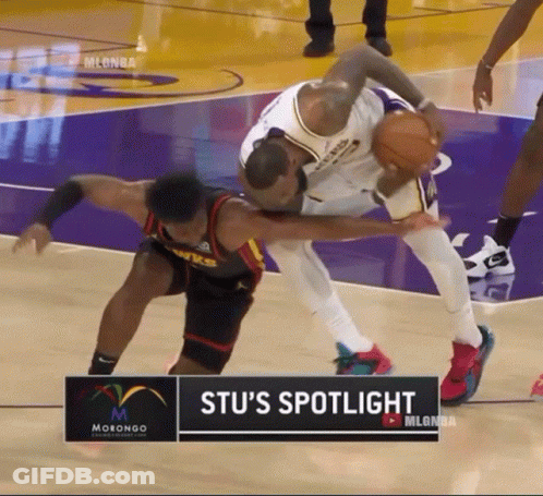 Basketball Players In Front Of Stu's Spotlight Sign GIF