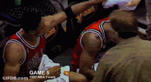 Basketball Players In Locker Room One Holding Ball GIF