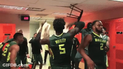 Basketball Players In Locker Room With Number 5 GIF