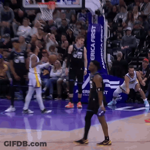 Basketball Players On A Court With A Banner That Says Erica First GIF