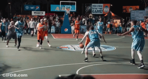 Basketball Players On A Court With A Sign That Says Make A Move Bring Your Game In The Background GIF