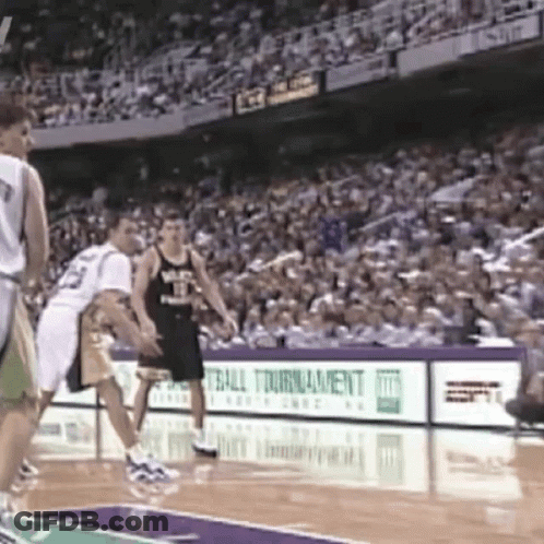 Basketball Players On Court With ESPN Ads GIF