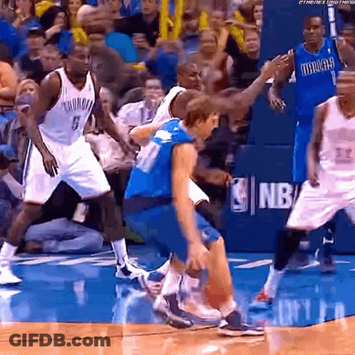 Basketball Players On Court With NBA Logo GIF