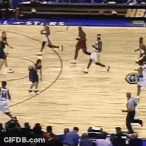 Basketball Players On Court With NBA Logo GIF