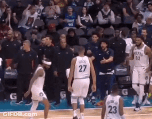 Basketball Players On Court With Number 27 Jersey GIF