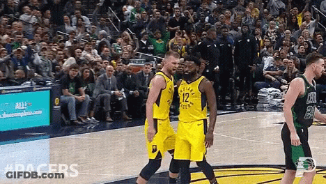 Basketball Players On Court With Pacers GIF