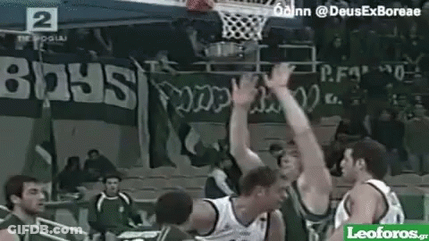 Basketball Players Playing In Front Of Boys Banner GIF