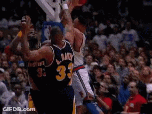 Basketball Players Playing In Front Of Crowd GIF