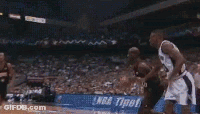 Basketball Players Playing In Stadium GIF