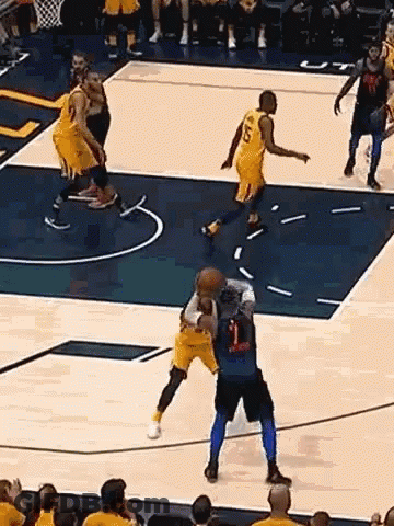 Basketball Players Playing On Court GIF