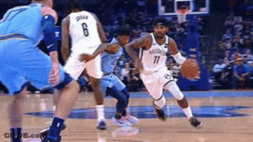 Basketball Players Playing On Court GIF