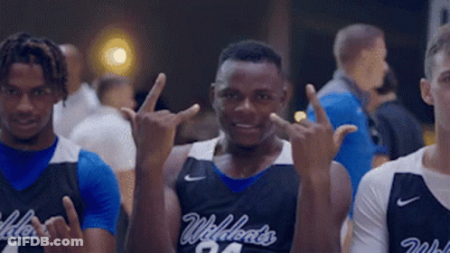 Basketball Players Posing With Number 24 Jersey GIF