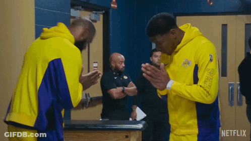 Basketball Players Praying In Locker Room GIF