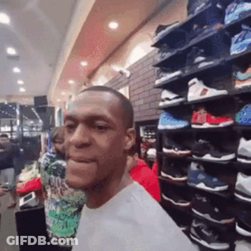 Basketball Players Shaking Hands One In Red Jersey GIF