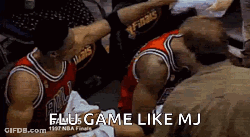 Basketball Players Sitting In Locker Room One Holding Ball GIF