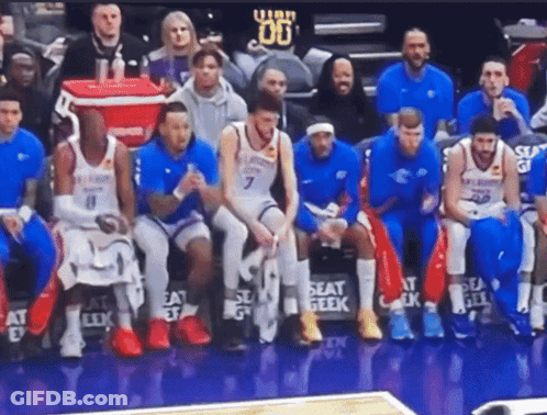 Basketball Players Sitting On Bench GIF