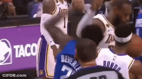 Basketball Players Standing Near Taco Sign GIF