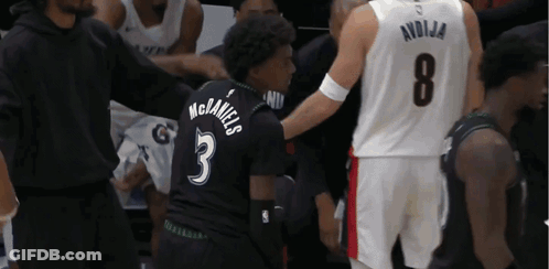 Basketball Players Standing On Court Number 11 GIF