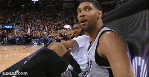 Basketball Players Watching Game GIF