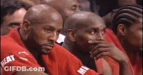 Basketball Players Watching Game One Covering Mouth GIF