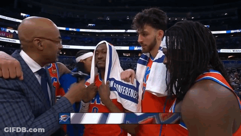 Basketball Players With Towel Saying Conference GIF