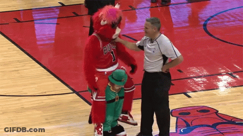 Basketball Referee Talks To Bulls Mascot GIF