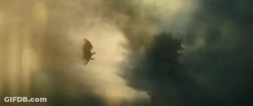 Bat Flying Through Cloudy Sky With Monster GIF