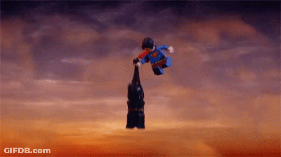 Bat Signal Flying Over Cartoon Superman GIF