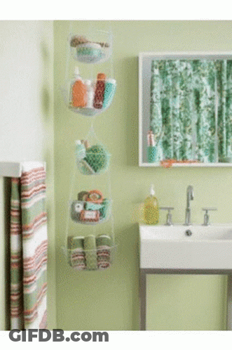 Bathroom With Green Walls Sink Mirror GIF