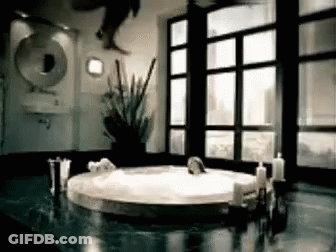Bathroom With Jacuzzi Tub And Candles GIF
