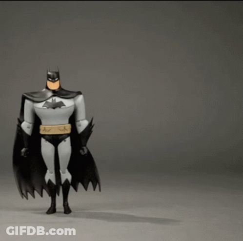 Batman Action Figure Flying Through Air GIF