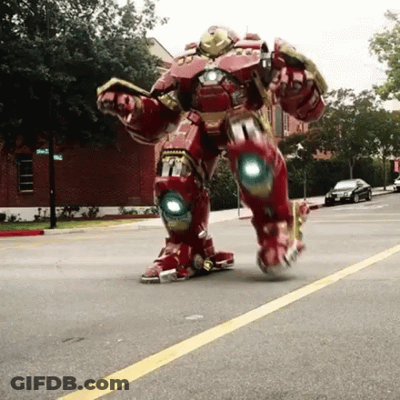 Batman And Batgirl Standing Beside All Lights And Door Locked Sign GIF