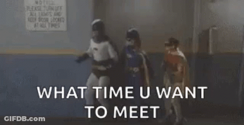 Batman And Batgirl Standing Next To Each Other GIF