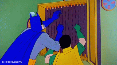Batman And Robin Are Standing Next To Each Other In Front Of A Cabinet . GIF