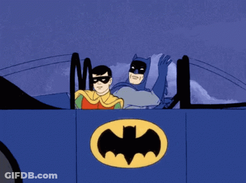 Batman And Robin Driving Batmobile GIF