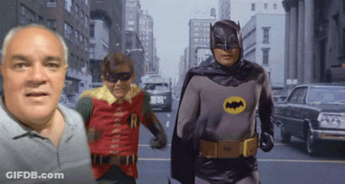 Batman And Robin Running Down City Street GIF