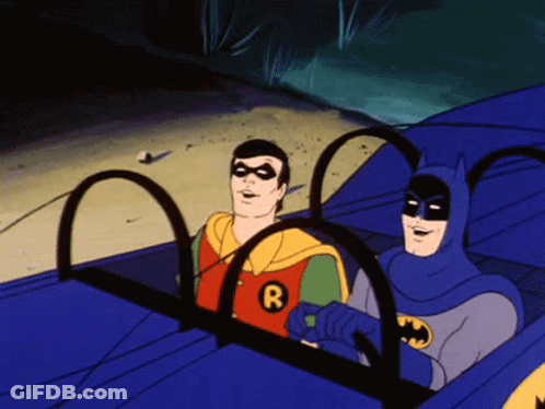 Batman And Robin Sitting In Car With Letter R GIF