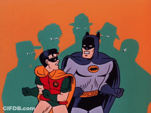 Batman And Robin Standing In Front Of Shadows GIF