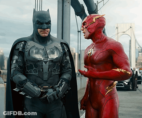 Batman And The Flash Standing Talking GIF